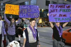 notablipintime:  I don’t have a source for this photo.  The man with the sign over his head saying he was just fired is my fiancé.  Our friend is holding the sign for him.  I am the one holding up the sign that says my fiancé was just fired.  In