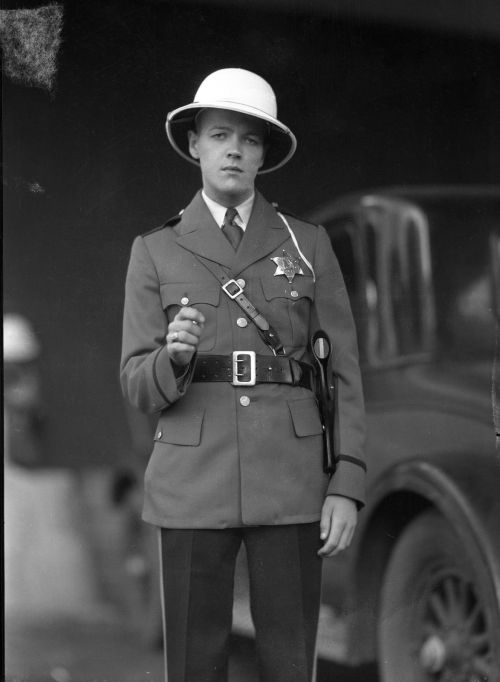 Chicago Police Officers model their new uniforms, designed to be worn during the Century of Progress