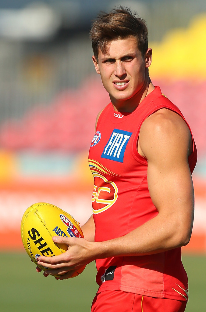 roscoe66:  David Swallow, Jaeger O’Meara and Jesse Lonergan of the Gold Coast Suns