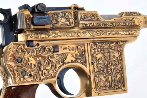 Engraved and gold plated Spanish Astra Model 900 broomhandle pistol, circa 1930’s.from Morphy 