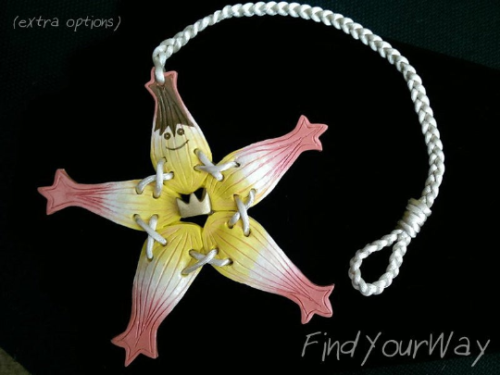 Kairi’s shell style wayfinders, and a custom Windything Wayfinder. made with polymer clay, pai