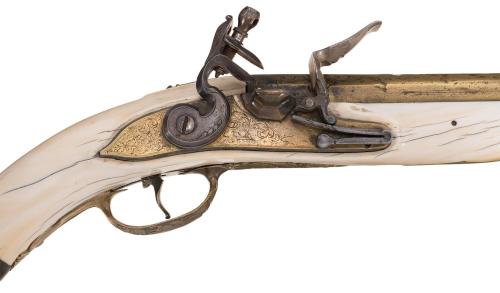 Victorian Era copy of an ivory stock 17th century Dutch Maastricht flintlock pistol.from Rock Island