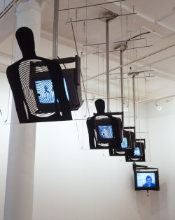 softpyramid:Dara BirnbaumHostage, 1994six-channel color video with five stereo-channels, audio, interactive laser, custom-designed mounts, Plexiglas shields