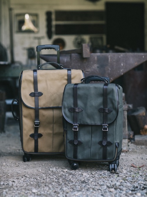 Introducing new abrasion-resistant Rugged Twill Rolling 4-Wheeled Luggage in Carry-On and Check-In s