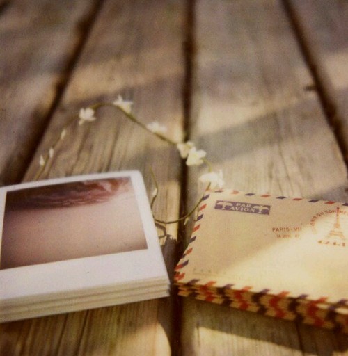Polaroids and vintage envelopes