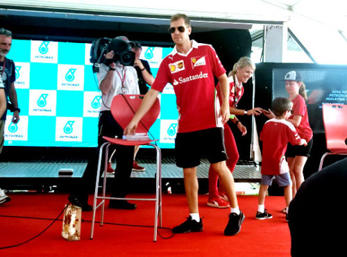 Seb taking photos with some kids after I gave him the trophy.