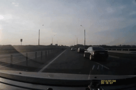 sixpenceee:Casually landing on the roof of a car after a crash. (Source)
