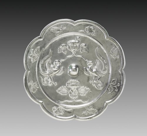 Lobed Mirror with Paired Phoenixes, a Nestling Bird, and a Lotus Blossom, 700s, Cleveland Museum of 