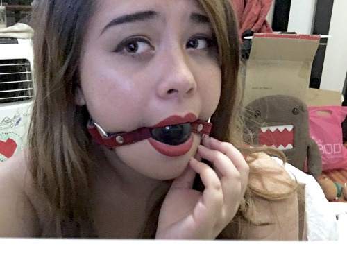 soysweetmilk:Me trying to decide if I like the look being gagged. Still haven’t come to a conclusion