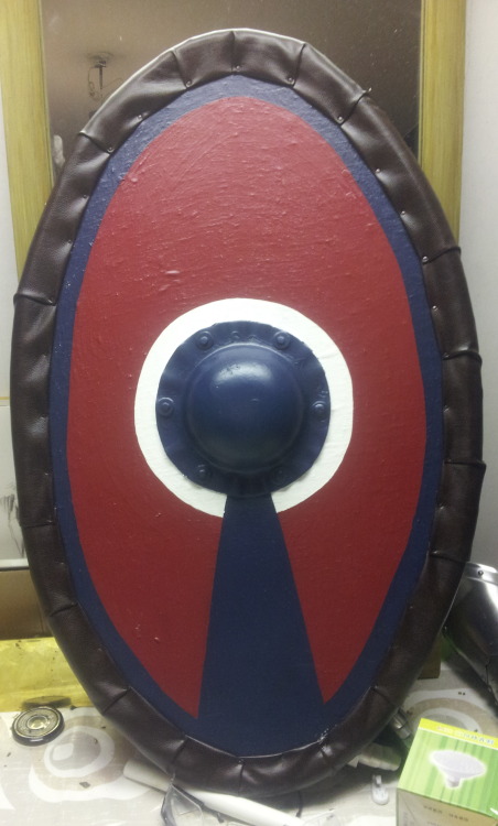 Has anyone ever wondered how to make a late Roman larping shield? I thought not. Here is how, anyway. The protective layer around the edge is the larping part - I wouldn’t want to accidentally knock my own teeth out, after all.