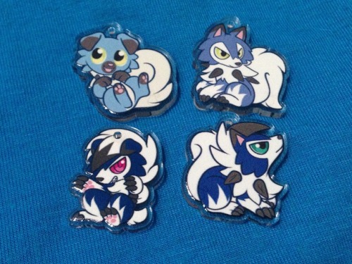 goldmouse: Double-Sided 1″ Acrylic Rockruff and Lycanroc Charms Available on Etsy!! These charms ar