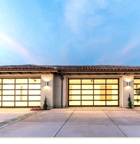 Garage MediumMid-sized Trendy Attached Three-car Garage Photo