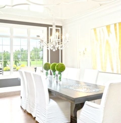 Enclosed CincinnatiLarge Transitional Image Of An Enclosed Dining Room With White Walls And No Fireplace
