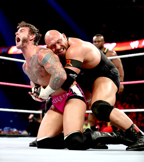 Facial expression in a pic can turn a simple wrestling hold into a dirty fantasy!