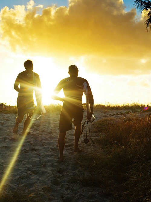 highenoughtoseethesea:  Beau Campi and Mick Fanning, into the sun. Ph: Corey Wilson 