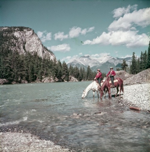 vintageeveryday: Riders pausing on the bank of the Bow River, Alberta, Canada, 1953.