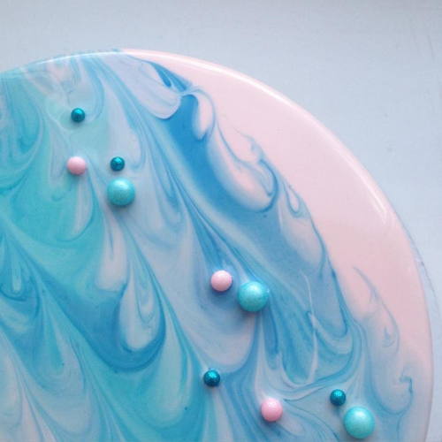 culturenlifestyle:  Hypnotic Cakes Resemble Candy Colored Marble Russian confectioner Olga Noskova produces uncanny baked goods, which resemble colored candy marble mirrors. Noskova’s baking talent quickly went viral, after the public feasted their