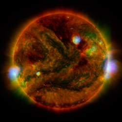 theheavenshavefallen:  just–space:  NuSTAR Stares at the Sun : Flaring, active regions of our sun are highlighted in this new image combining observations from several telescopes.  js