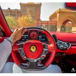 simplyclassywatches:  Can you name the watch here? 🔍 Great photo by @s.kh and stunning Ferrari interior 🔴 | Crazy Discounts on Luxury Watches: http://bit.do/discountwatches