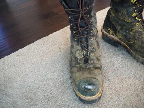 My abused black super Chippewa logger boots.  Love how the steel is all exposed on them!  Paint and 