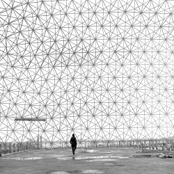      Walking on the top-level platform, A photograph of Joseph Beuys in Buckminster Fuller’s iconic geodesic dome of the Expo 67 pavilion on Montreal’s Île Sainte-Hélène, 1984 — Robert Duchesnay     