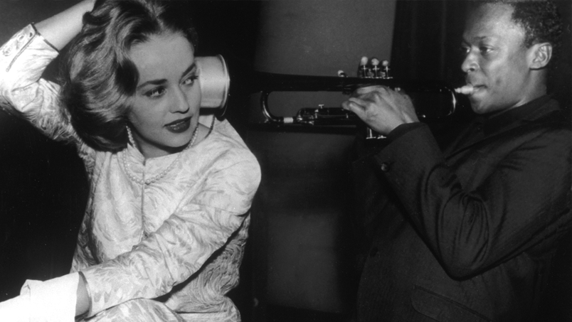 petersonreviews:Jeanne Moreau and Miles Davis behind the scenes of Elevator to the