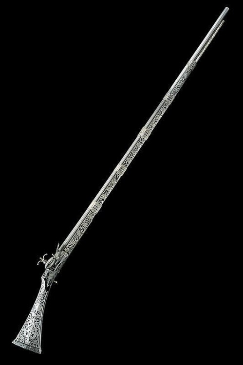 A beautiful silver mounted miquelet musket crafted by a gunmaker named &ldquo;Kahli&rdquo; f