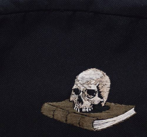 adipocere:Hand embroidery on black polyester. 