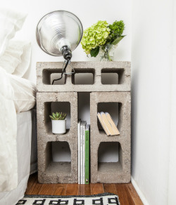 thisoldapt:  Concrete cinderblocks make for an amazing low-cost nightstand when softened with flowers and accessories -KH VIA theinterioredge VIA dwell 