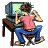 the backside of a person typing on their big PC and tapping their foot