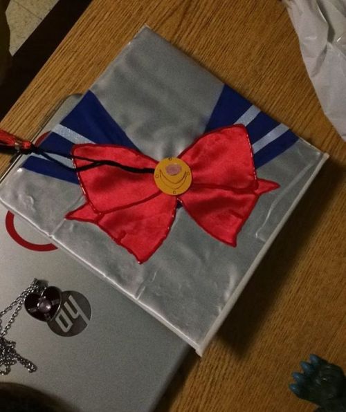 My graduation cap. Not done yet but getting there! Still need a sailor Venus and Mercury! Graduation