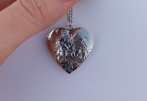 Got One Of Those Cheap Heart Lockets You Put Pictures In