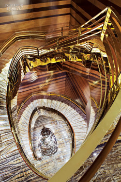 interiordesignmagazine:  At Maison Louis Vuitton in Shanghai, Peter Marino used a spiral staircase with steps of rare Iranian onyx and champagne-hued balustrades electroplated in polished stainless steel to lure customers inside. Photography by Manolo