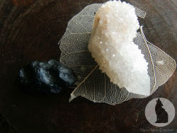 mysticxmoon:  These are the two crystals Thierry and I got from the psychic expo last weekend.. tektite (on the left) and quartz spirit quartz (right) 