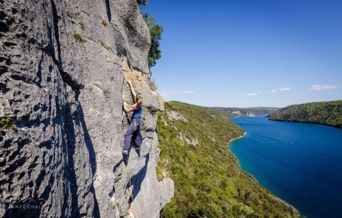 #285 Climb the rocks above the waters of Lim Fjord, just a 20 minute car ride away from Rovinj.Photo