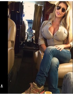 funbaggery:  Monica on a jet. Wonder if her tits blew up from the cabin pressure?