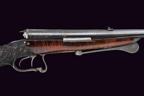 peashooter85:  A rare Dreyse pinfire double rifle originating from Germany, mid 19th century.  Beautifully & ornately engraved scroll work. -fms