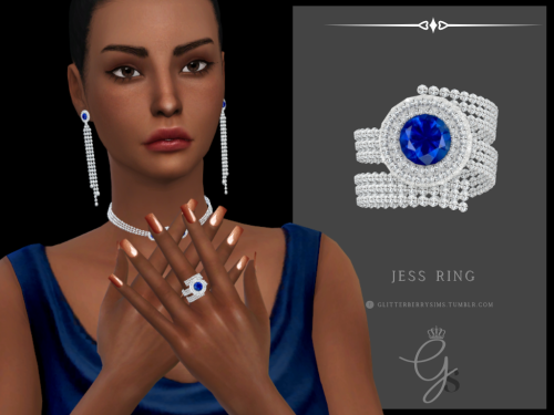 Jess Ring (Middle)A designer diamond and sapphire ring. A gorgeous spiral design encrusted with diam