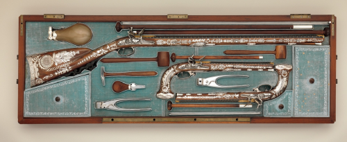 Exquisite cased set of a flintlock rifle and pair of pistols, crafted by Nicolas Noel Boutet, master