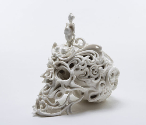 asylum-art:  															Beautifully Intricate Porcelain Skulls by Katsuyo Aoki Katsuyo Aoki creates stunningly intricate porcelain skulls. Her work is almost like a three-dimensional expansion on the tradition of calavera, decorated skulls made of