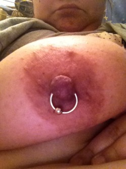 coupletryingthings:  That nipple ring gets