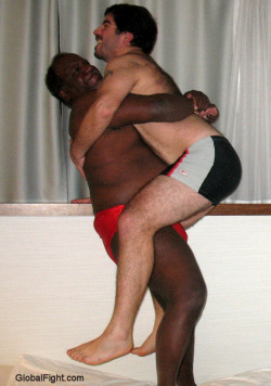 wrestlerswrestlingphotos:  black daddy bearhugging