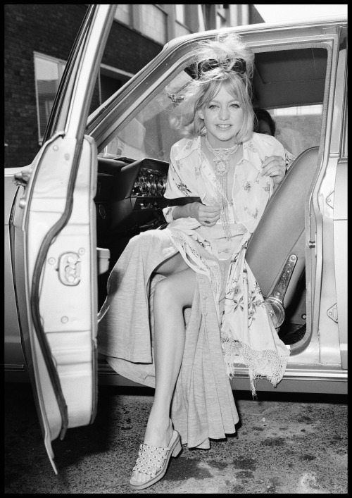 Goldie Hawn exits her car as she prepares to board a plane from London to France to start filming Th