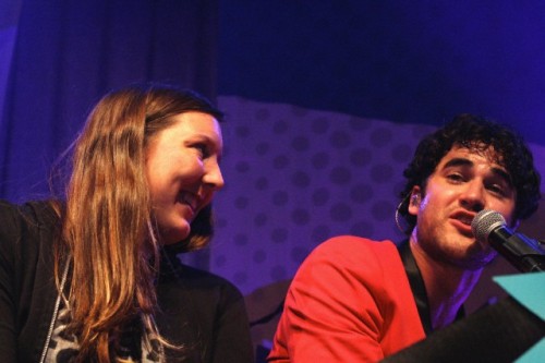 Darren Criss with a fan on stage in concert at The Fillmore in San Francisco, CA