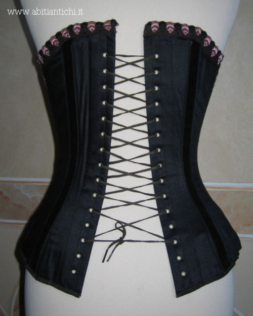 Black silk satin corset with pink flossing1890sWaist: 51 cm (20 inches)