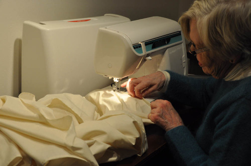 Chief Conservator Esther Méthé and conservation intern Annaïck Keruzec are rehousing our oversize te