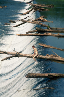 loverofbeauty:  William (Floating Trees), by Ryan McGinley  Interesting photo, but actually probably very hazardous.  Dams like this can be very dangerous.  Best to do one&rsquo;s skinny dipping elsewhere.