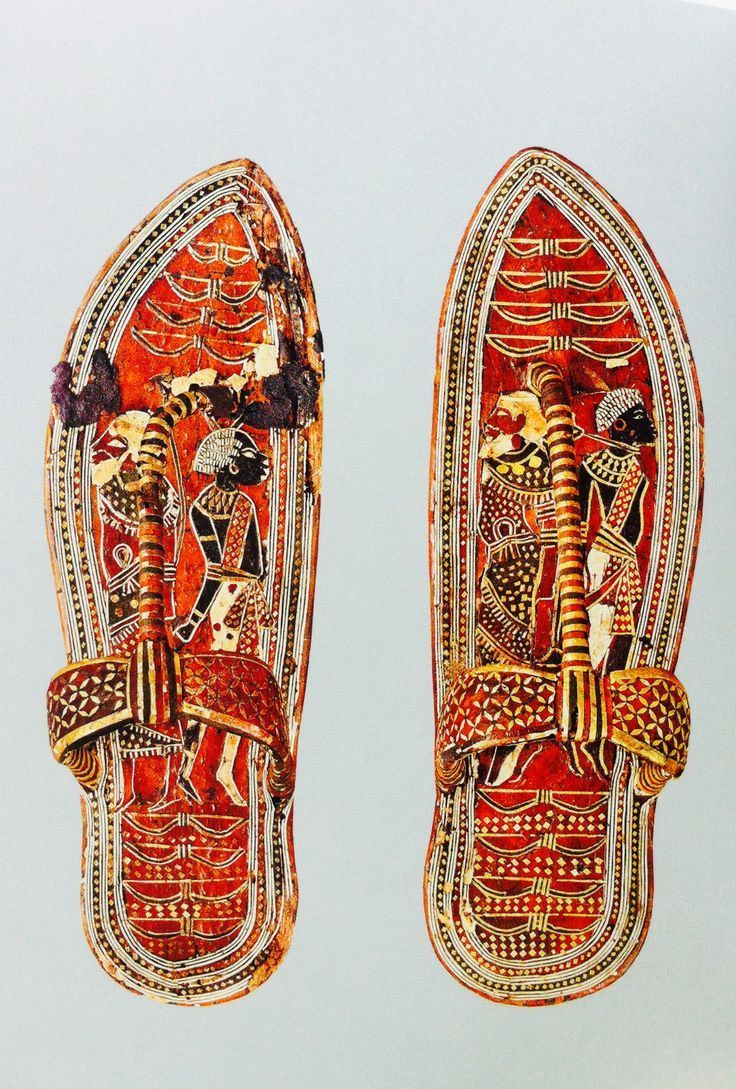 elhieroglyph:  Ancient Egyptian sandals made of wood with leather bark and gold embellishments