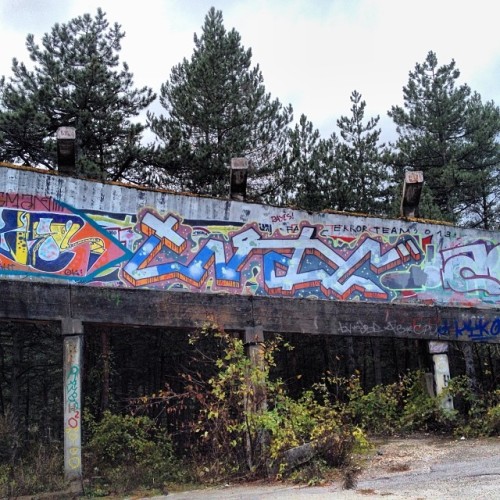 instagram:  Exploring Sarajevo’s Abandoned Olympic Park  To see more photos and videos of Sarajevo’s Olympic bobsled and luge track, explore the Olimpijski Bob Staza and Trebević location pages.  Stark against the dense forests of Trebević mountain