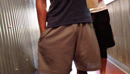 visiblepenisline:  Two jock guys in line behind me.  The guy with the grey shorts was clearly wearing nothing underneath.